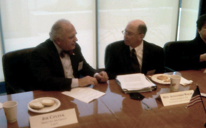 Joe Czyzyk talking with Alejandro D. Wolff, US Ambassador to Chile